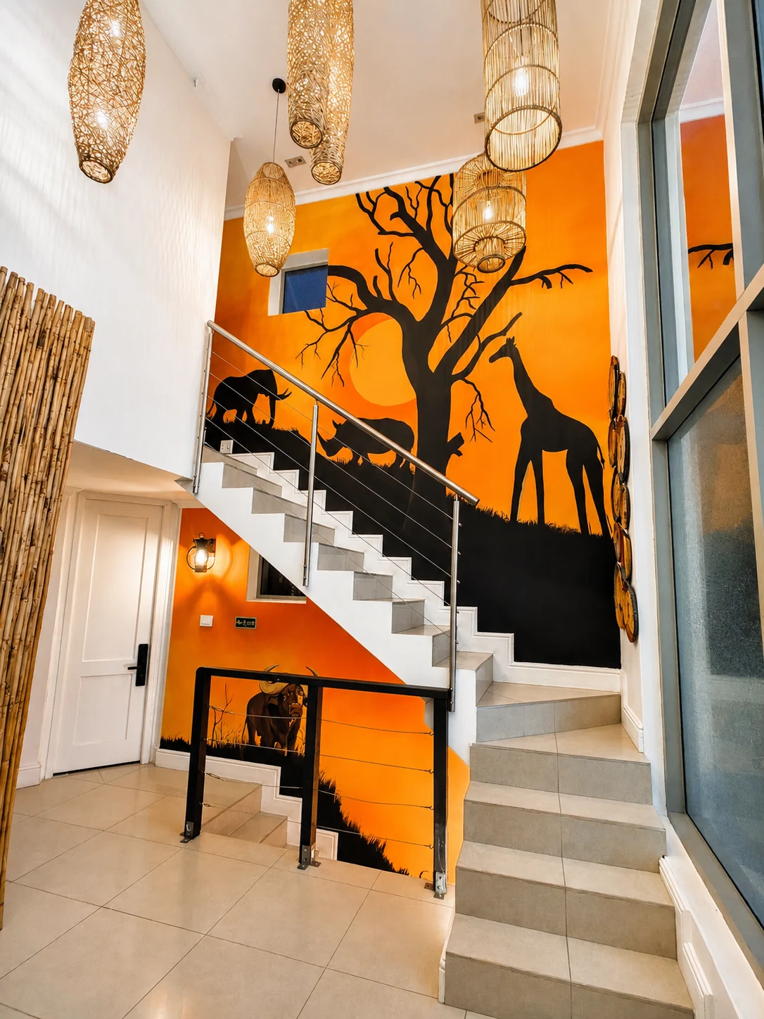 VistaBlu staircase with artwork by Only Mpofu