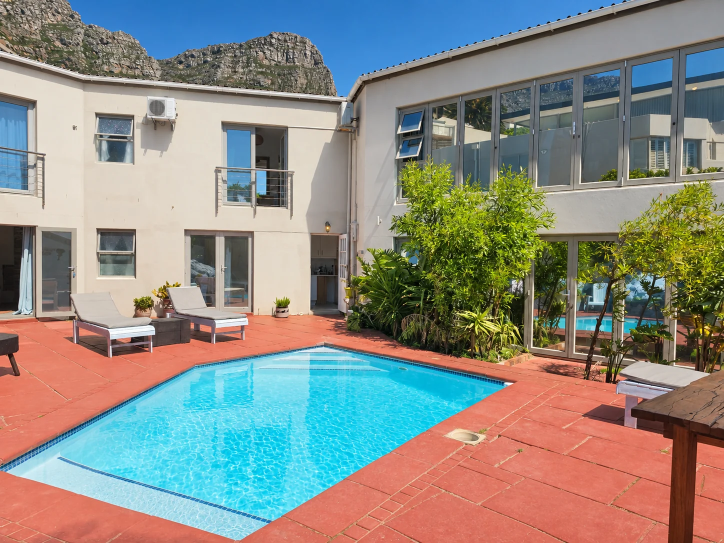 VistaBlu courtyard pool with the mountain beyond